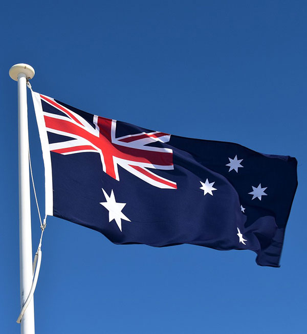 australia-g839335cdc_1280 Australian flag flying on flagpole.